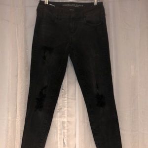 Low rise black ripped jeans